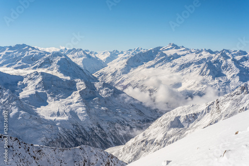 Skiing and Snowboarding in the winterly Stubai Alps © benicoma