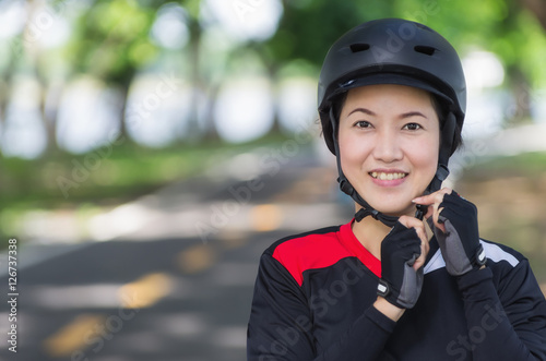 Women wearing Bike Helmet.