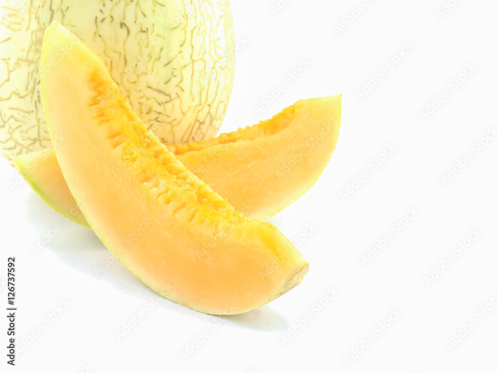 Selective focus of slice cantaloupe isolated over white Selective focus of slice cantaloupe isolated over white