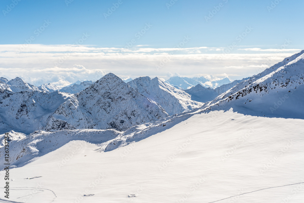 Skiing and Snowboarding in the winterly Stubai Alps