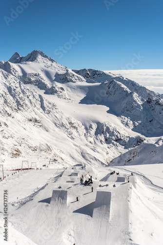 Skiing and Snowboarding in the winterly Stubai Alps