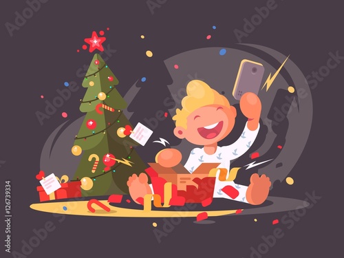 Child opens Christmas present.