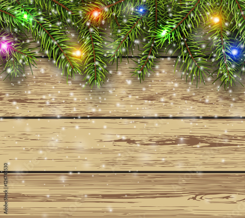 Christmas background fir tree on wooden board