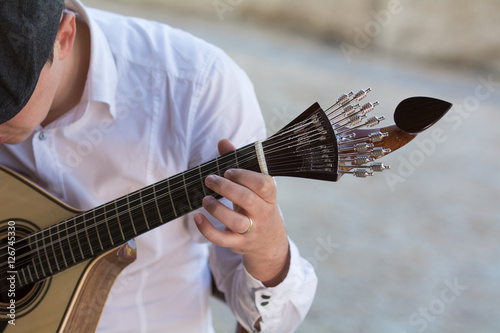 Cantando Fado y tocando guitarra portuguesa  photo