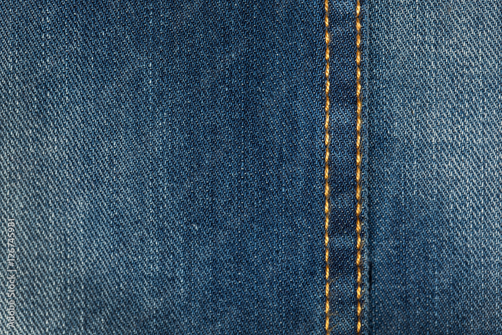 Textile Blue Jeans Fabric Series; Close-ups of Details of a pair of jeans trousers with front pockets Textile Blue Jeans Fabric Series; Close-ups of Details of a pair of jeans trousers with front pockets