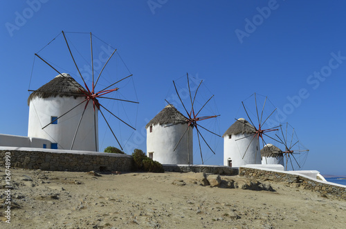 Landscape with windmills and blue sky in the Greek island of Myconos