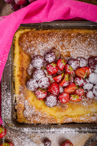 Pancake cooking in a plate with fruit photo