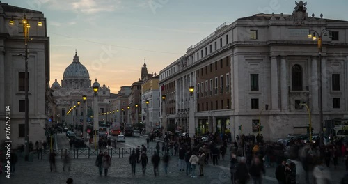 Rome, Italy - Vatican City - View through Via della Conciliazione to St Peter's Basilica at sunset with colorful evening sky - Timelapse with motion