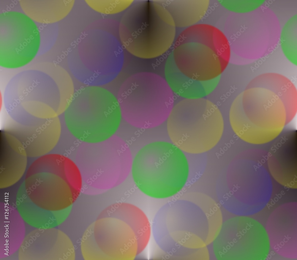 on gray blurred background of yellow, red, blue, pink, green bright balls on gray blurred background of yellow, red, blue, pink, green bright balls
