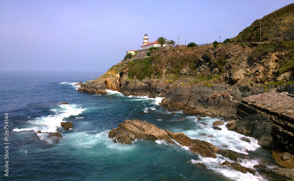 View of the lighthouse of Cudillero in Asturias, Spain
