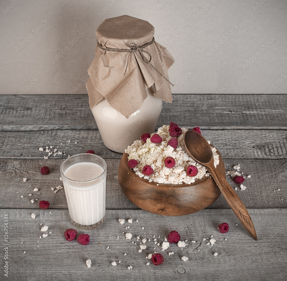 dairy products, fresh milk and cottage with raw raspberry on woo