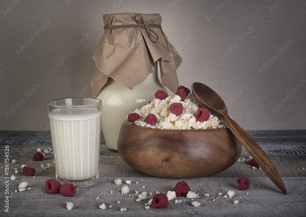 dairy products, fresh milk and cottage with raw raspberry on woo