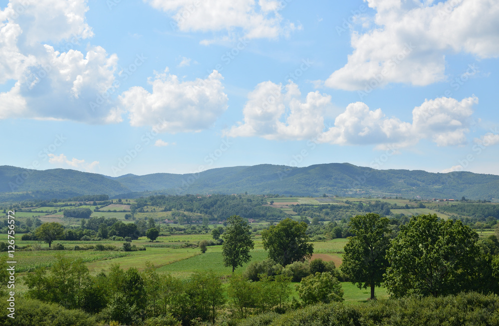 Landscape of fields and mountain in background in central Serbia