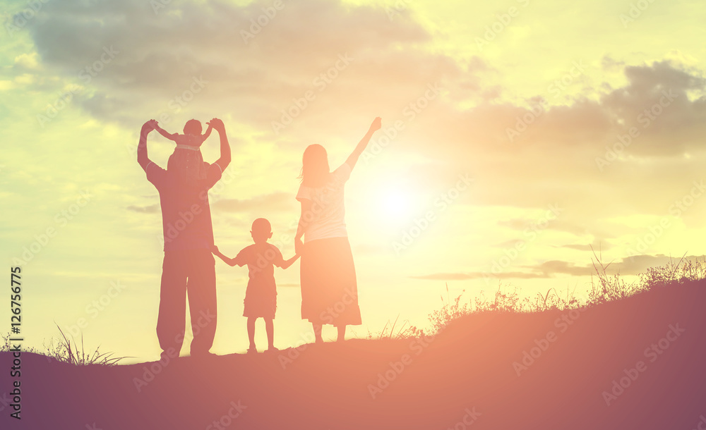 Happy family dancing on the road in the sunset time. Evening par