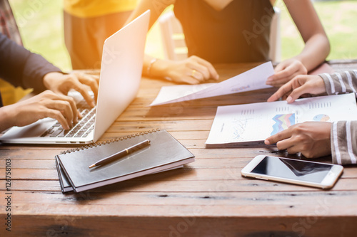 Business team working on laptop, while sitting at office. Busine