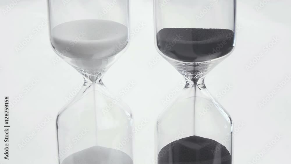 Sand flows through an hourglass. For concepts such as time, watch Sand flows through an hourglass. For concepts such as time, watch