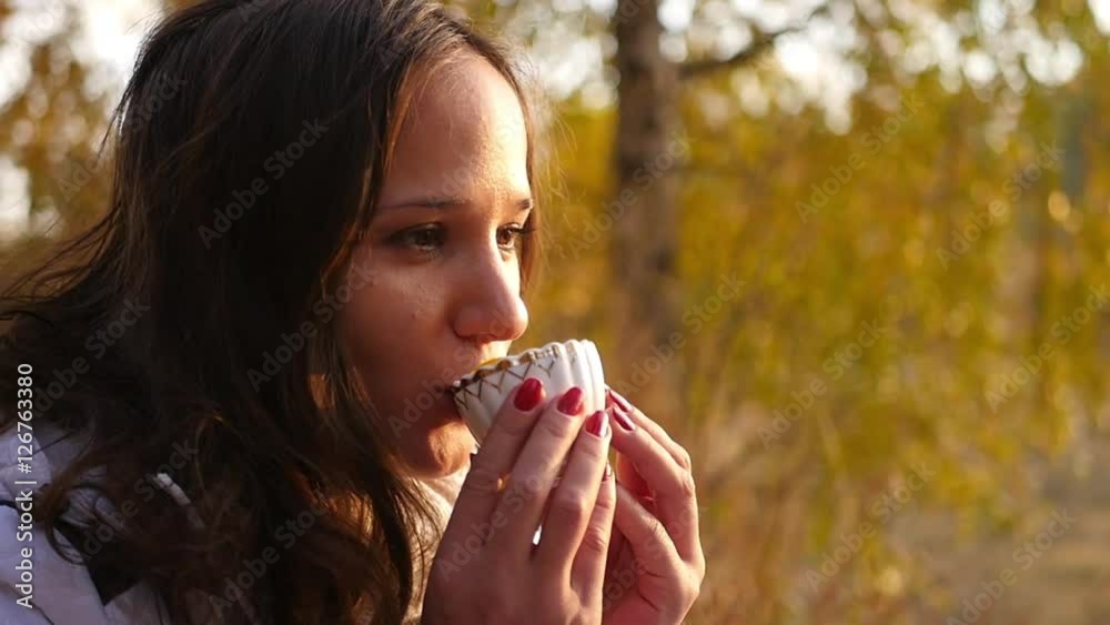 girl in a good mood drinking tea girl in a good mood drinking tea