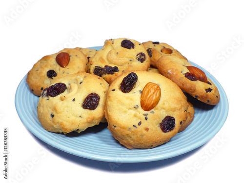 Plate of Almond Raisin Butter Cookies Isolated on White Background 