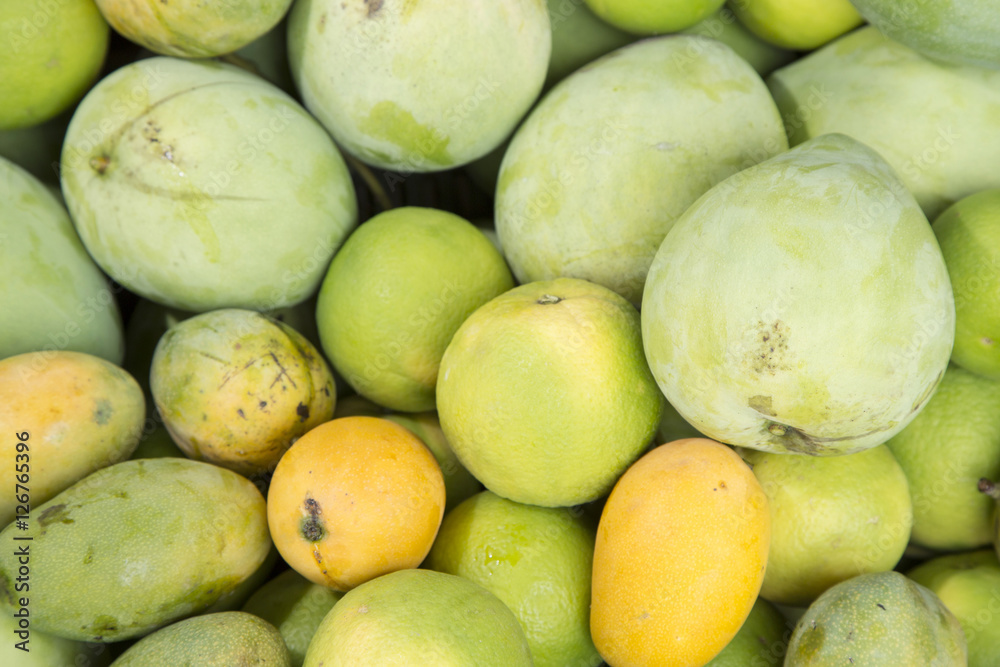 Mangos and oranges in the street Mangos and oranges in the street