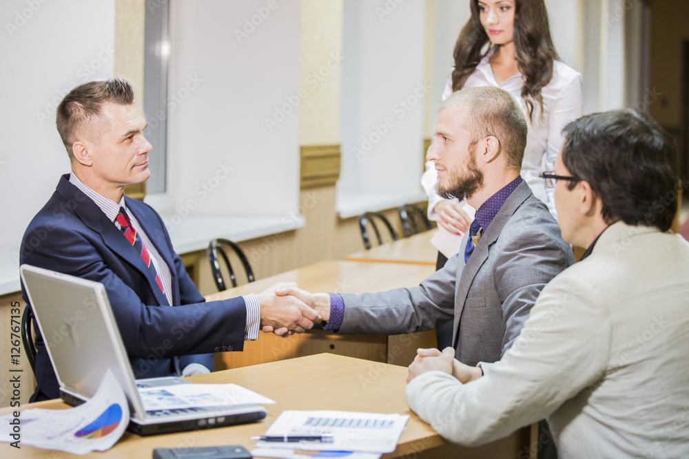 shaking hands during business meeting shaking hands during business meeting