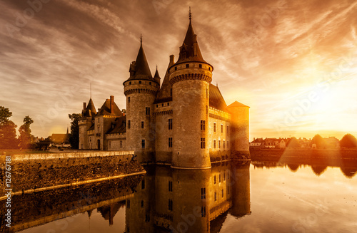 Chateau of Sully-sur-Loire at sunset, France. Medieval castle in Loire Valley in summer.