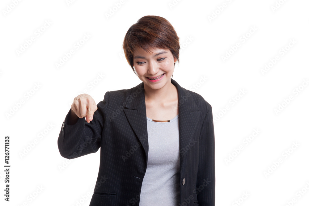 Beautiful young Asian woman point down to blank space. Beautiful young Asian woman point down to blank space.