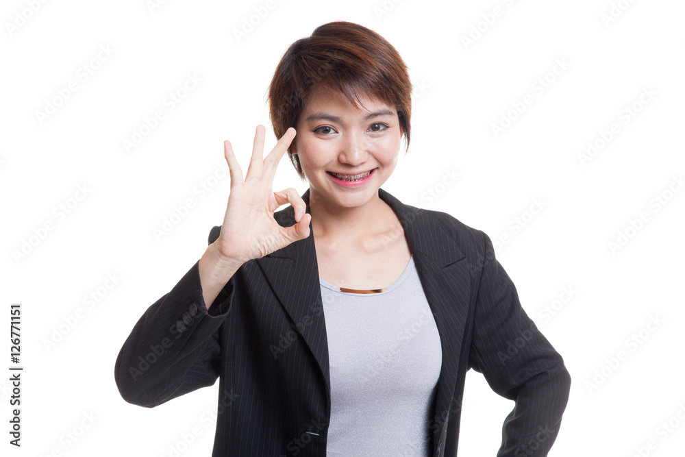 Young Asian business woman show OK sign. Young Asian business woman show OK sign.