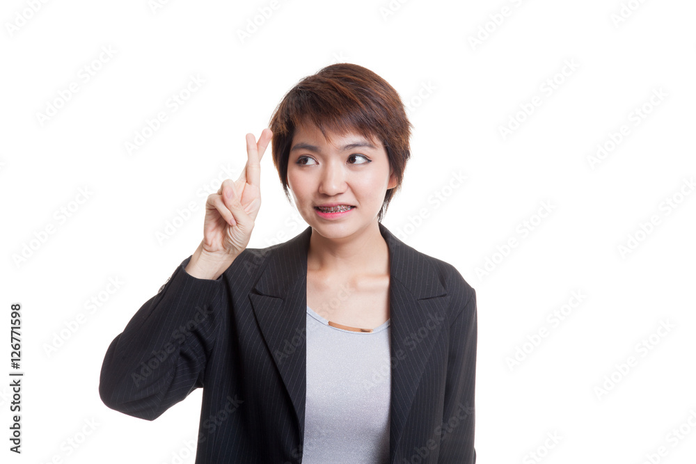 Beautiful young Asian woman cross finger. Beautiful young Asian woman cross finger.