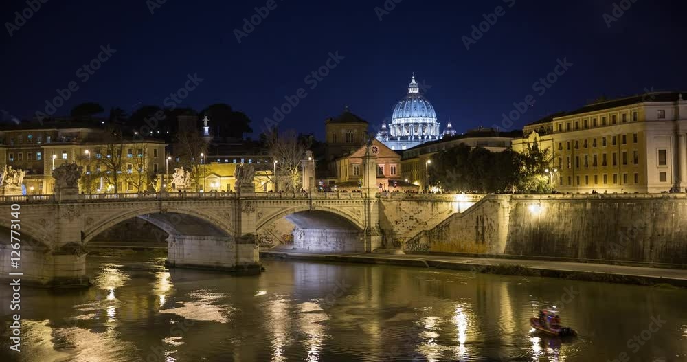 Rome, Italy - illuminated san angelo bridge with Tiber river at night with view of St Peters Basilica - Timelapse without motion - New Years Eve Rome, Italy - illuminated san angelo bridge with Tiber river at night with view of St Peters Basilica - Timelapse without motion - New Years Eve
