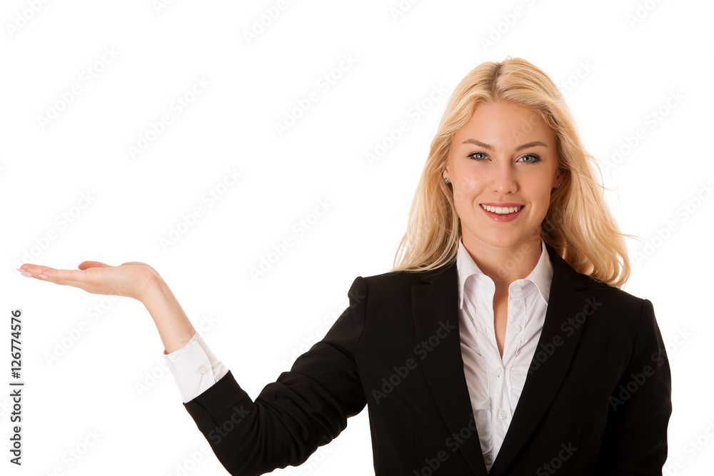 woman pointing to cpoy space - holding arm as presenting a produ woman pointing to cpoy space - holding arm as presenting a produ