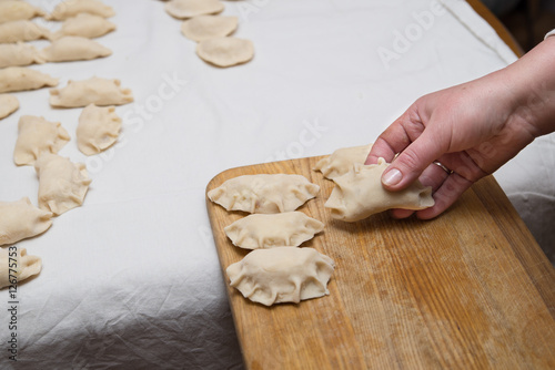 Prepared dumplings on cotton cloth. photo