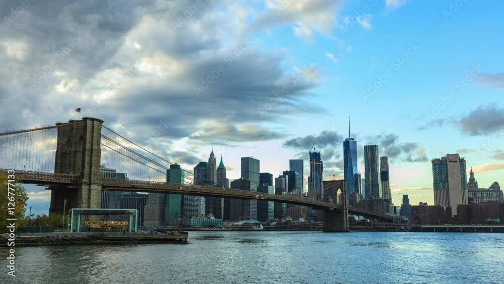 View to Manhattan skyline from Brooklyn Bridge Park in the morning time lapse View to Manhattan skyline from Brooklyn Bridge Park in the morning time lapse