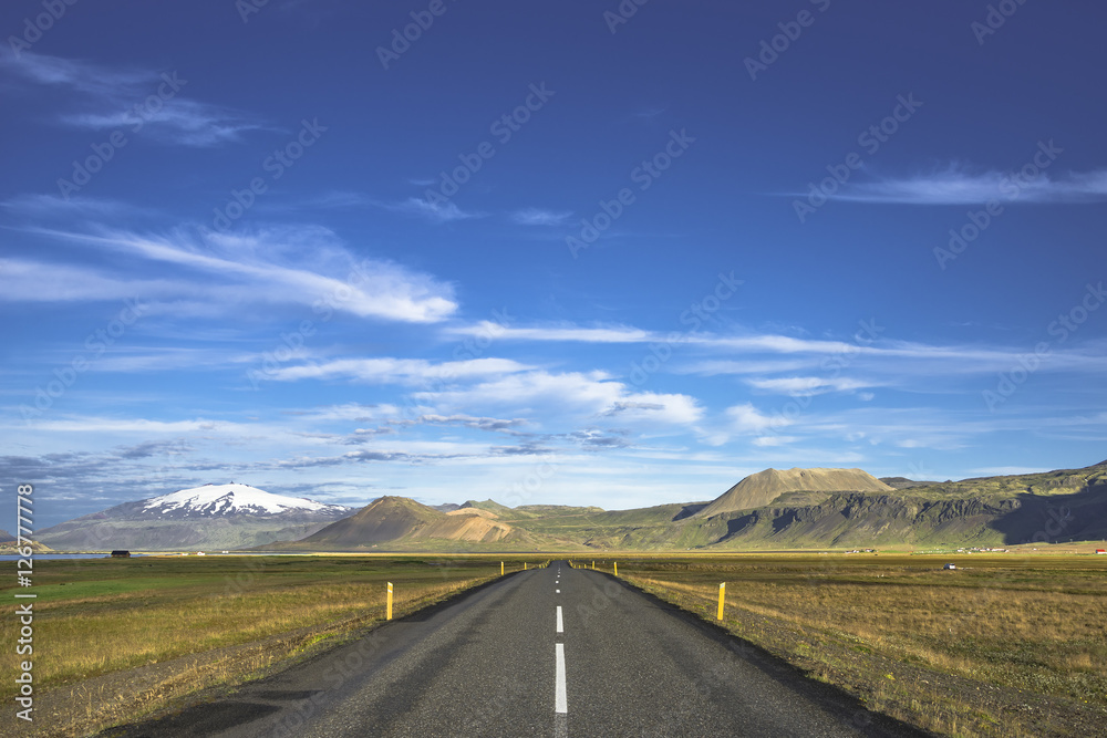 Isolated road to Snaefellsjoekull mountain at Iceland, summer ti