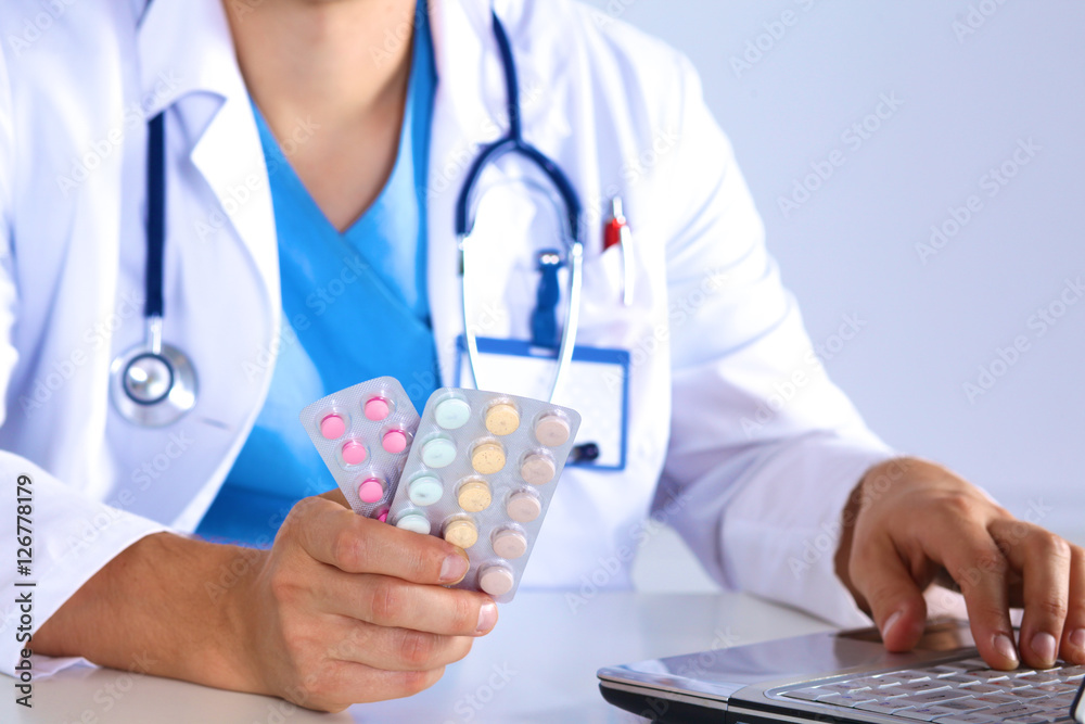young doctor in the Office makes an entry young doctor in the Office makes an entry