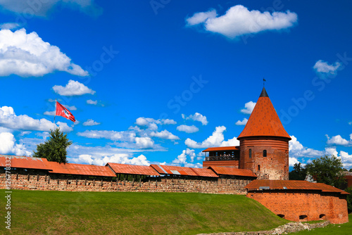 Old castle in Kaunas, Lithuania. The restored castle on a background of blue sky. The fortress in the old town.