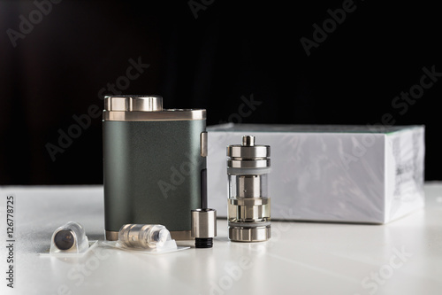 
Packaging and accesories, evaporators to the electronic cigarette VAPE, much nicotine vapor instead photo