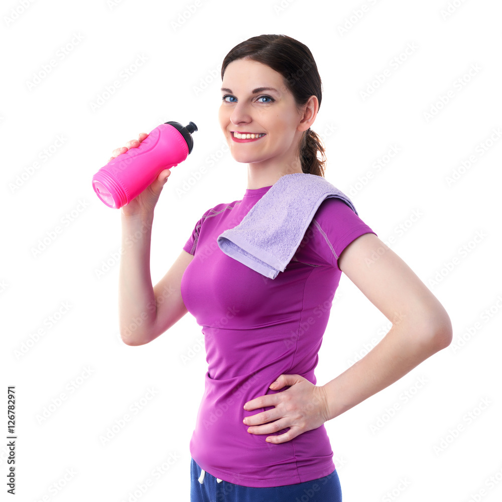 Smiling sporty woman in violet T-short over white isolated background Smiling sporty woman in violet T-short over white isolated background