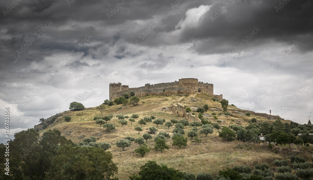 Medieval castle in Medellin Village on a cloudy day, province of Badajoz, Spain