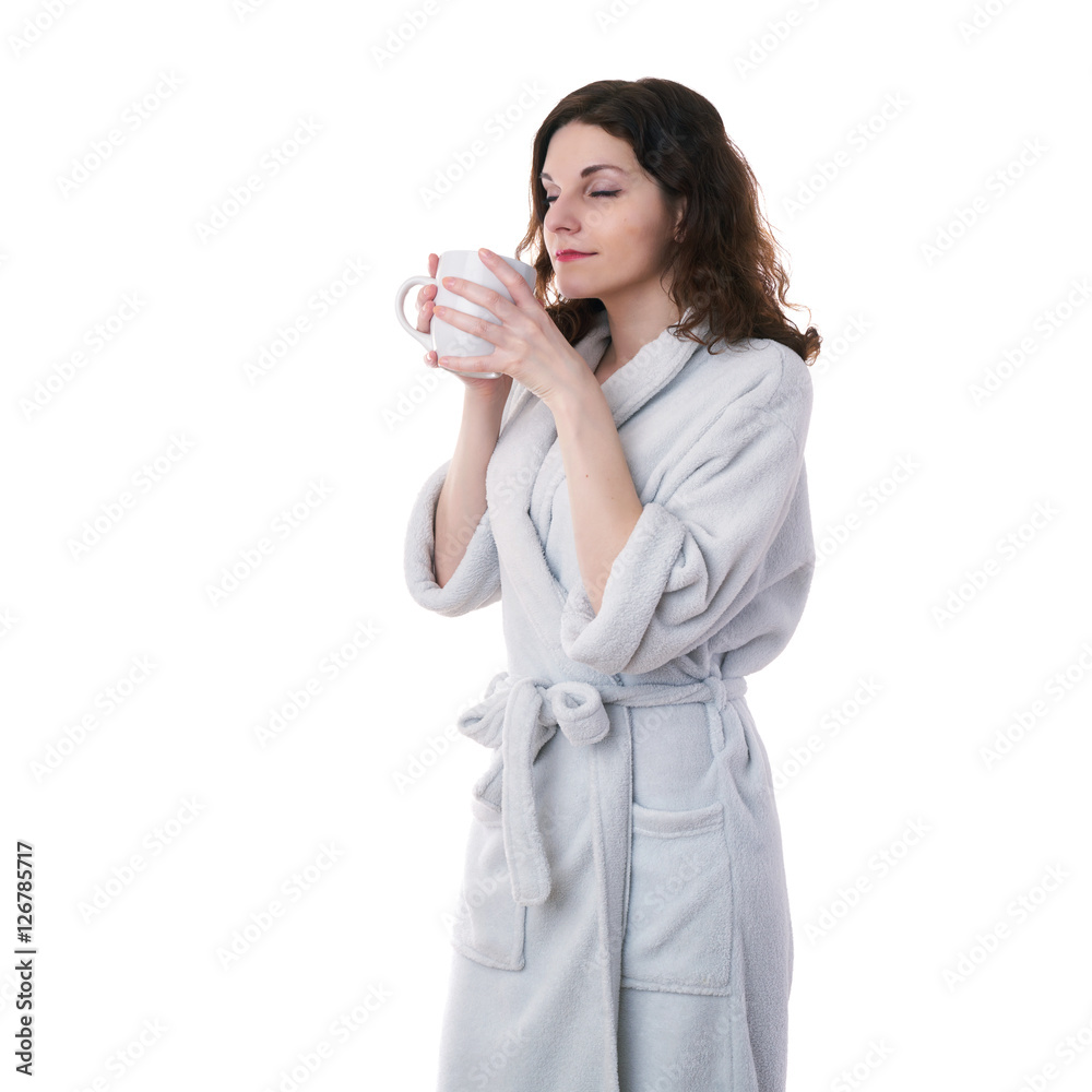 Young woman in bath robe over white isolated background Young woman in bath robe over white isolated background