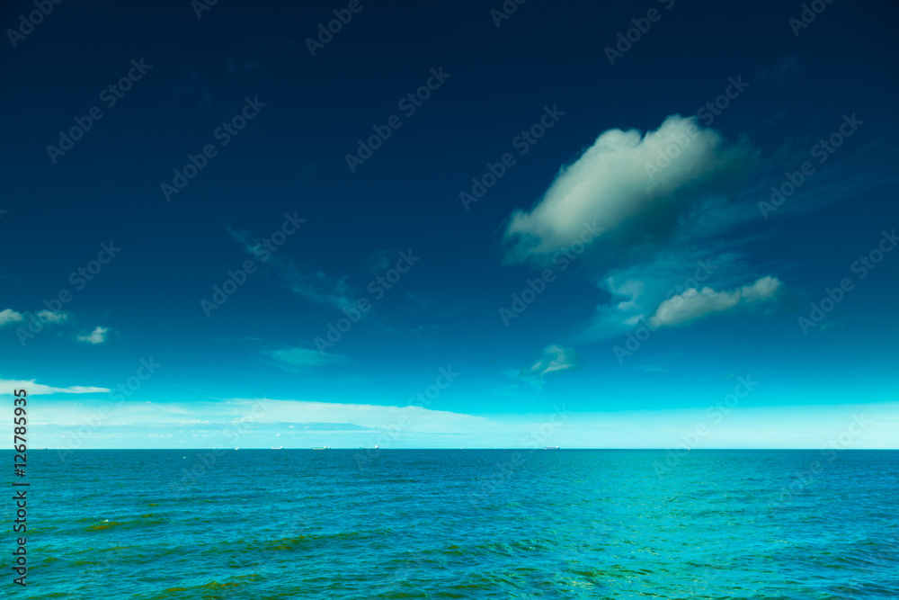 Landscape. View of blue sky at sea or ocean water.
