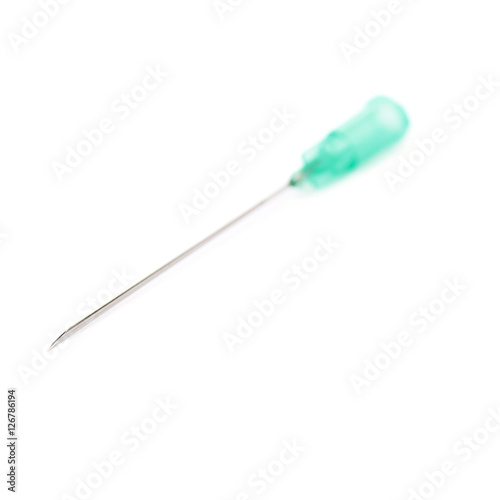 Medical syringe needle isolated over white background