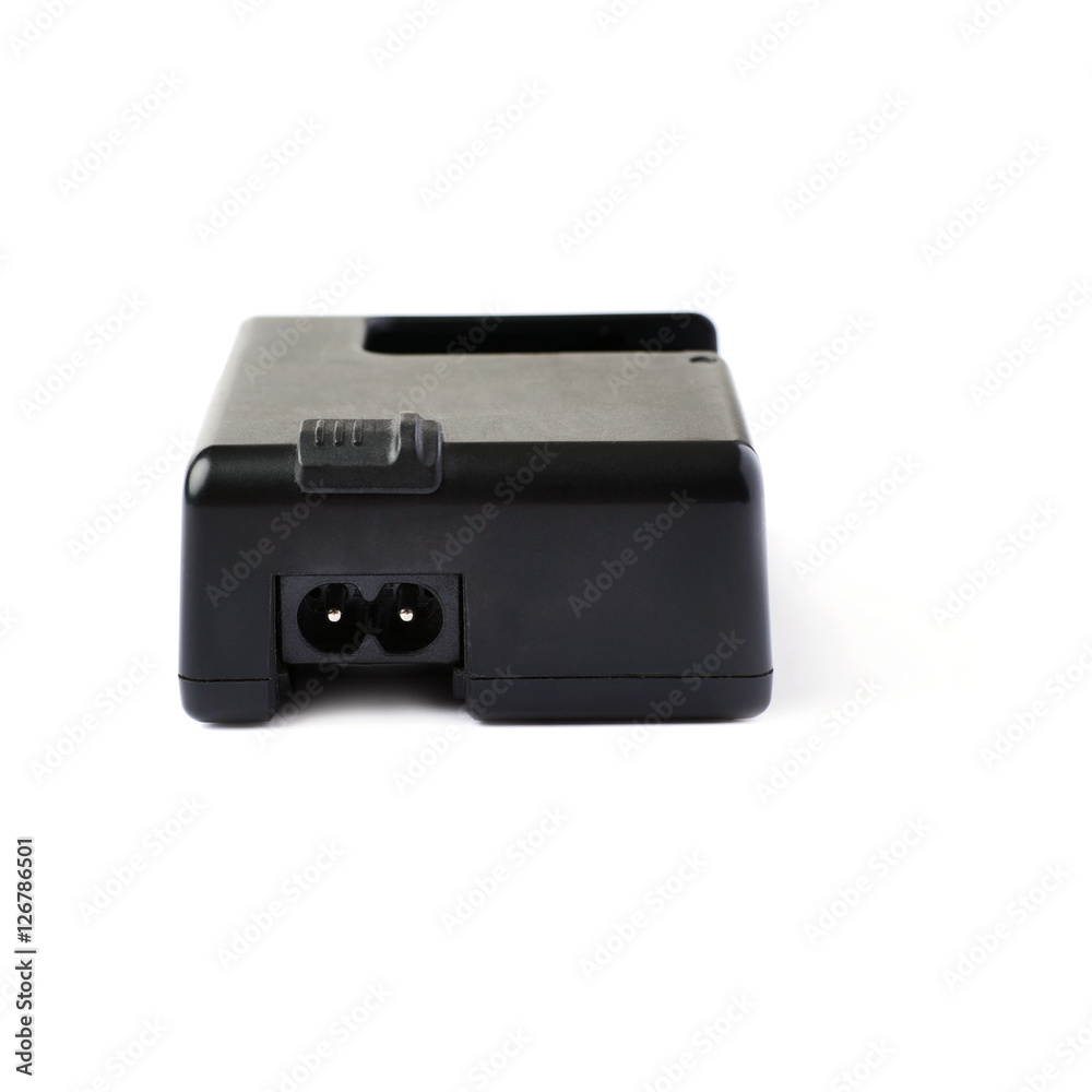 Battery charger isolated over white background Battery charger isolated over white background