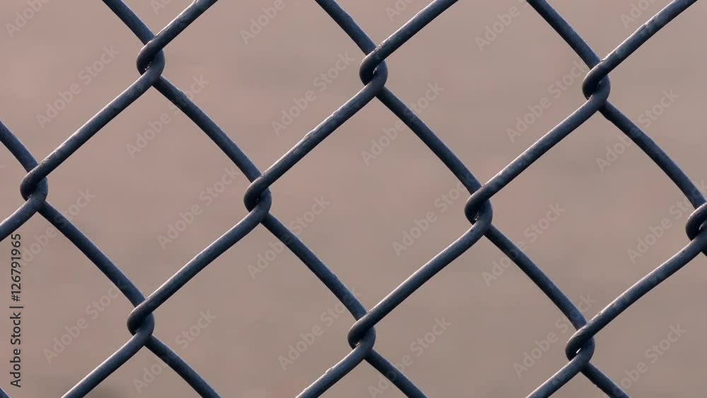 Moving Past Wire Fence At Sunrise Moving Past Wire Fence At Sunrise