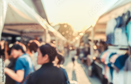 Fotografie Blur background of people shopping at market fair at street with