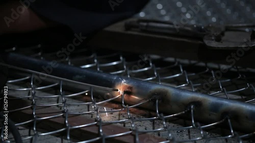 Welder works in the dark 