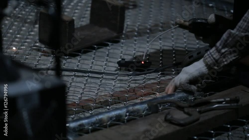 Welder works in the dark 