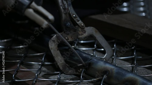 Welder works in the dark 