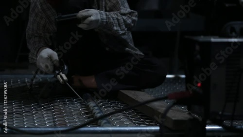 Welder works in the dark 