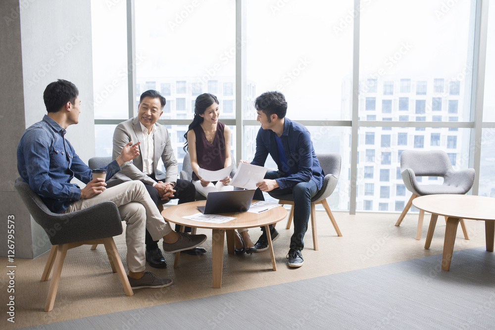 Business people talking in office meeting Business people talking in office meeting