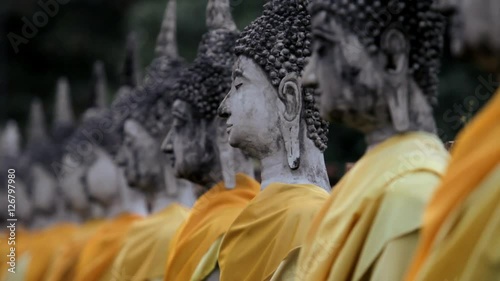 CU TU SELECTIVE FOCUS Meditating Buddha statues / Ayutthaya, Thailand photo